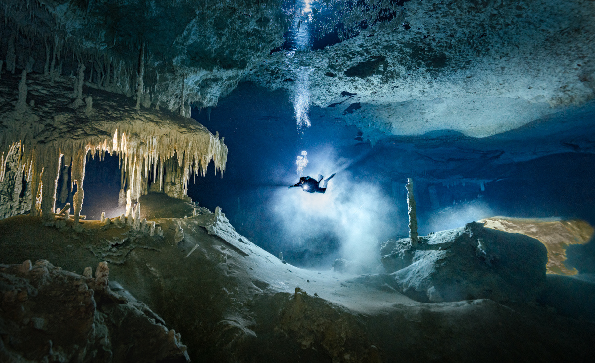 Diver in a flooded cave